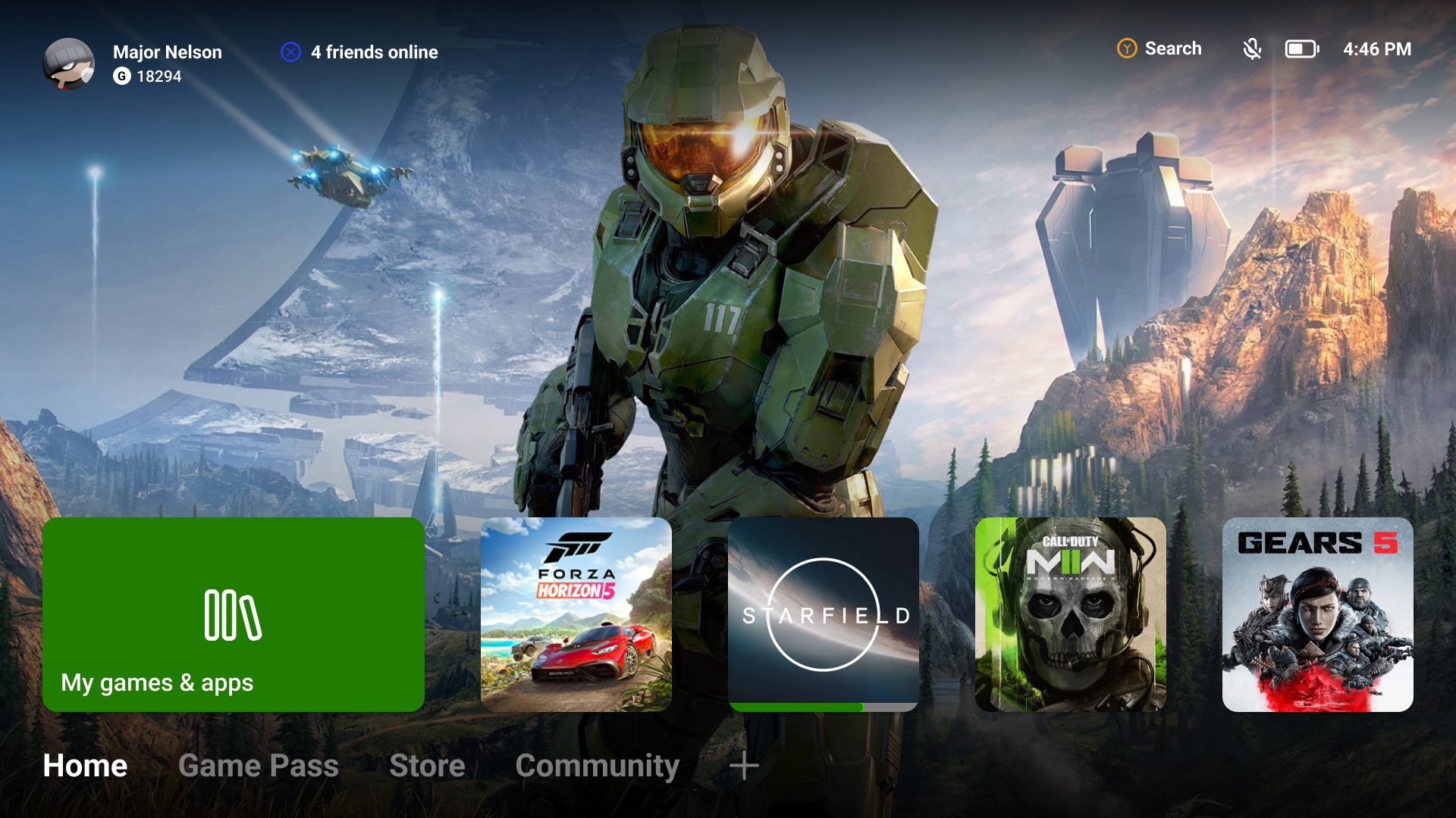 The redesigned Xbox home screen: visible background art, recently played games in a single row, and a horizontal navigation bar